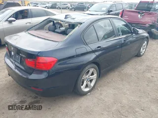 2015 BMW 3 Series 328i xDrive with VIN WBA3B3C54FF547033, listed as a IAAI auction lot 41184204 with 87,664 mi miles and . Bid and sale history available at DreamBid. Image 4.