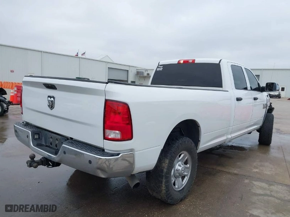2018 Ram 2500 Tradesman with VIN 3C6UR5HL5JG399270, listed as a IAAI auction lot 41134177 with 128,713 mi miles. Bid and sale history available at carsss.com. Image 4.