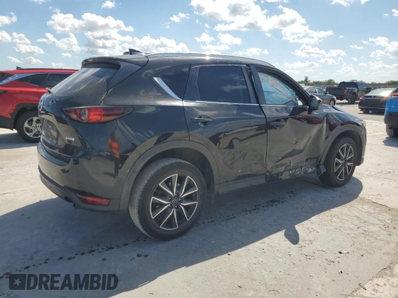 2018 Mazda CX-5 Touring with VIN JM3KFACM0J1408075, listed as a Copart auction lot 50866735 with Not Provided miles and Salvage Title. Bid and sale history available at carsss.com. Image 3.