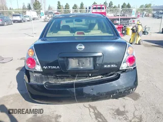2003 Nissan Altima S with VIN 1N4AL11D93C268136, listed as a IAAI auction lot 41960386 with 181,444 mi miles. Bid and sale history available at carsss.com. Image 16.