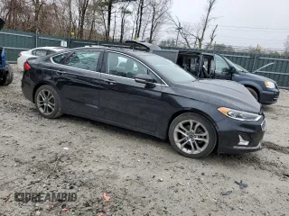 2020 Ford Fusion Titanium with VIN 3FA6P0RU5LR141328, listed as a Copart auction lot 55718165 with 94,536 mi miles and Non repairable. Bid and sale history available at DreamBid. Image 4.