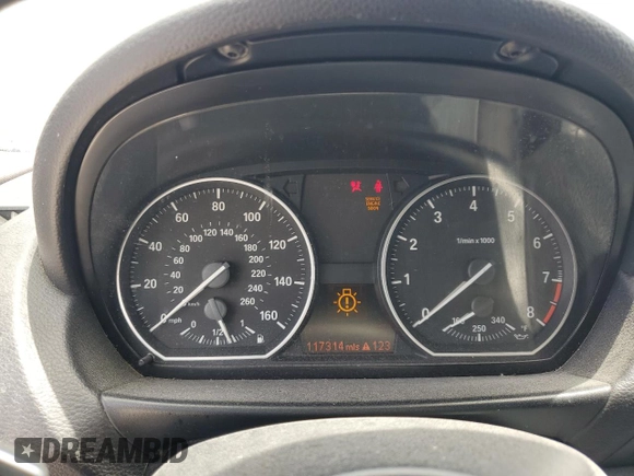 2012 BMW 1 Series 135i with VIN WBAUC9C5XCVM12807, listed as a Copart auction lot 61680225 with 117,314 mi miles and Salvage title. Bid and sale history available at DreamBid. Image 9.