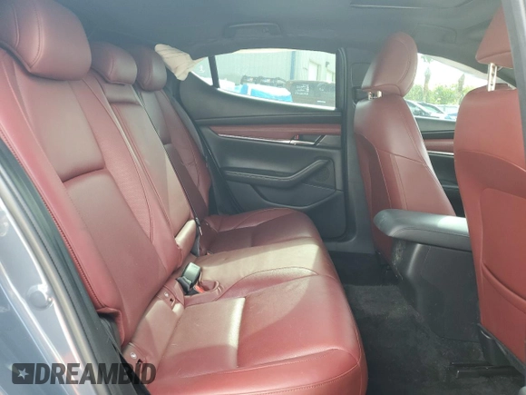 2021 Mazda 3 Premium Plus with VIN JM1BPBNYXM1403126, listed as a Copart auction lot 59971535 with 56,952 mi miles and Salvage title. Bid and sale history available at DreamBid. Image 10.