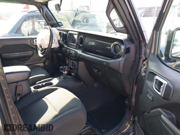 2022 Jeep Wrangler Unlimited Sport S with VIN 1C4HJXDG5NW105931, listed as a IAAI auction lot 42349628 with 37,314 mi miles and . Bid and sale history available at DreamBid. Image 5.