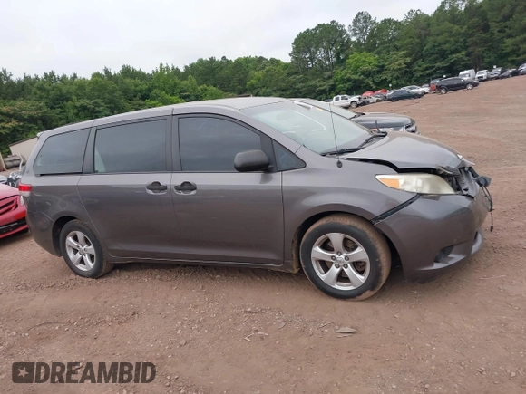 2014 Toyota Sienna L with VIN 5TDZK3DC8ES470837, listed as a IAAI auction lot 42426844 with 302,661 mi miles and . Bid and sale history available at DreamBid. Image 13.