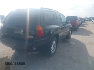 2006 GMC Envoy SLT with VIN 1GKDS13S062234137, listed as a IAAI auction lot 41561864 with 221,031 mi miles. Bid and sale history available at carsss.com. Image 4.