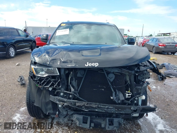 2021 Jeep Grand Cherokee Laredo X with VIN 1C4RJEAG2MC511713, listed as a IAAI auction lot 42343008 with 71,192 mi miles and . Bid and sale history available at DreamBid. Image 13.