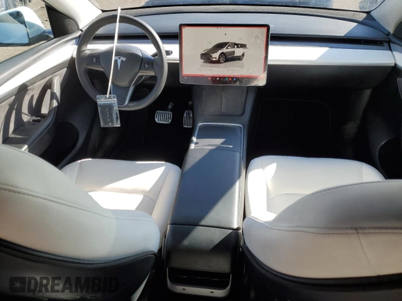 2023 Tesla Model Y Long Range z VIN 7SAYGAEE2PF758235, wystawiony jako Copart lot #49059895 z przebiegiem 57 615 mil mil oraz Czysty tytuł • Clean title. Historia ofert i sprzedaży dostępna na DreamBid. Obrazek 8.