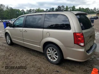2015 Dodge Grand Caravan SXT with VIN 2C4RDGCG7FR536049, listed as a Copart auction lot 55963115 with 141,228 mi miles and Clean Title. Bid and sale history available at DreamBid. Image 2.