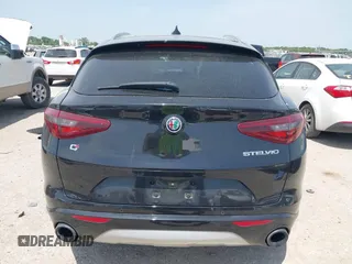 2020 Alfa Romeo Stelvio Ti z VIN ZASPAKBN8L7C95979, wystawiony jako IAAI lot #42018506 z przebiegiem 30 198 mil mil oraz . Historia ofert i sprzedaży dostępna na DreamBid. Obrazek 16.