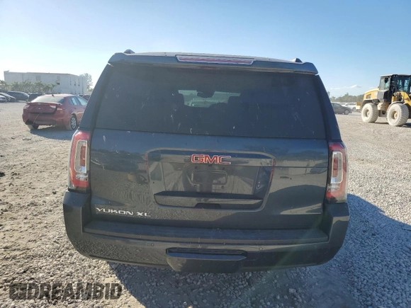 2019 GMC Yukon XL SLT with VIN 1GKS1GKCXKR325814, listed as a Copart auction lot 82221454 with 65,803 mi miles and Salvage Title. Bid and sale history available at carsss.com. Image 6.