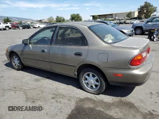1998 Mazda Protege DX z VIN JM1BC1414W0203670, wystawiony jako Copart lot #62966544 z przebiegiem 249 405 mil mil oraz Szkoda całkowita • Salvage title. Historia ofert i sprzedaży dostępna na DreamBid. Obrazek 2.