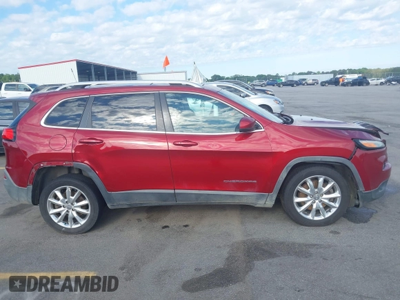 2016 Jeep Cherokee Limited with VIN 1C4PJLDSXGW127497, listed as a IAAI auction lot 42173536 with 240,866 mi miles and . Bid and sale history available at DreamBid. Image 13.