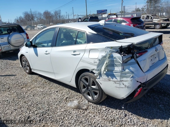 2021 Toyota Prius L Eco with VIN JTDKAMFUXM3142402, listed as a IAAI auction lot 41665484 with 67,416 mi miles. Bid and sale history available at carsss.com. Image 3.
