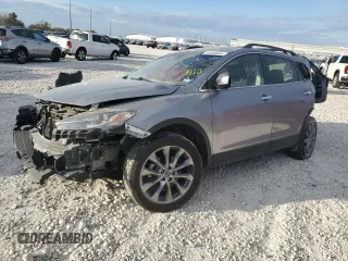 2015 Mazda CX-9 Grand Touring z VIN JM3TB2DA5F0468215, wystawiony jako Copart lot #53961975 z przebiegiem Nie podano mil oraz Szkoda całkowita • Salvage title. Historia ofert i sprzedaży dostępna na DreamBid. Obrazek 1.