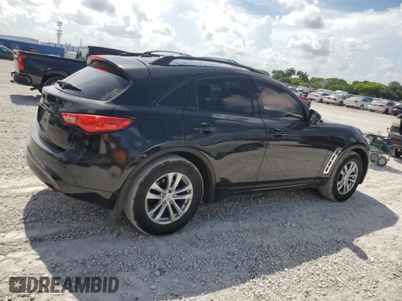 2014 Infiniti QX70 z VIN JN8CS1MU4EM451883, wystawiony jako Copart lot #61744725 z przebiegiem 60 393 mil mil oraz Czysty tytuł • Clean title. Historia ofert i sprzedaży dostępna na DreamBid. Obrazek 3.