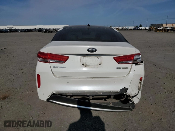 2017 Kia Optima EX z VIN KNAGU4LE9H5013620, wystawiony jako Copart lot #60928515 z przebiegiem 158 263 mil mil oraz Szkoda całkowita • Salvage title. Historia ofert i sprzedaży dostępna na DreamBid. Obrazek 6.