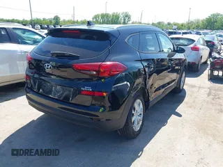 2019 Hyundai Tucson Value with VIN KM8J3CA46KU935335, listed as a IAAI auction lot 42296162 with 65,099 mi miles and . Bid and sale history available at DreamBid. Image 4.