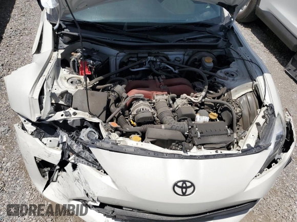 2018 Toyota 86 GT z VIN JF1ZNAE1XJ9700563, wystawiony jako Copart lot #56340975 z przebiegiem 59 482 mil mil oraz Szkoda całkowita • Salvage title. Historia ofert i sprzedaży dostępna na DreamBid. Obrazek 11.