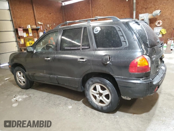 2004 Hyundai Santa Fe GLS with VIN KM8SC73E74U597688, listed as a Copart auction lot 44570985 with 213,584 mi miles and Salvage Title. Bid and sale history available at carsss.com. Image 2.