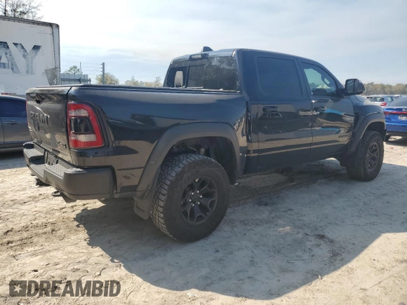 2022 Ram 1500 TRX with VIN 1C6SRFU99NN430718, listed as a Copart auction lot 49576035 with 29,476 mi miles and Salvage title. Bid and sale history available at DreamBid. Image 3.