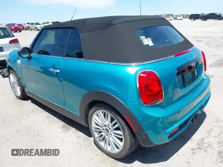2017 MINI Convertible Cooper S z VIN WMWWG9C30H3C80917, wystawiony jako IAAI lot #42227320 z przebiegiem 38 490 mil mil oraz . Historia ofert i sprzedaży dostępna na DreamBid. Obrazek 3.