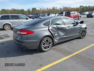 2019 Ford Fusion SEL with VIN 3FA6P0CD9KR252892, listed as a IAAI auction lot 41087776 with 109,498 mi miles and . Bid and sale history available at DreamBid. Image 4.