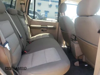 2004 Ford Explorer Sport Trac XLS z VIN 1FMZU67K34UC40112, wystawiony jako Copart lot #57877855 z przebiegiem 139 350 mil mil oraz Szkoda całkowita • Salvage title. Historia ofert i sprzedaży dostępna na DreamBid. Obrazek 10.