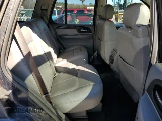 2007 GMC Envoy SLE z VIN 1GKDT13SX72118720, wystawiony jako Copart lot #88278185 z przebiegiem 212 605 mil mil oraz Szkody całkowita. Historia ofert i sprzedaży dostępna na DreamBid. Obrazek 11.