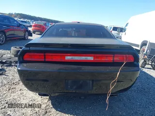 2014 Dodge Challenger R/T Plus z VIN 2C3CDYBT2EH274265, wystawiony jako IAAI lot #41845052 z przebiegiem 120 290 mil mil oraz . Historia ofert i sprzedaży dostępna na DreamBid. Obrazek 16.