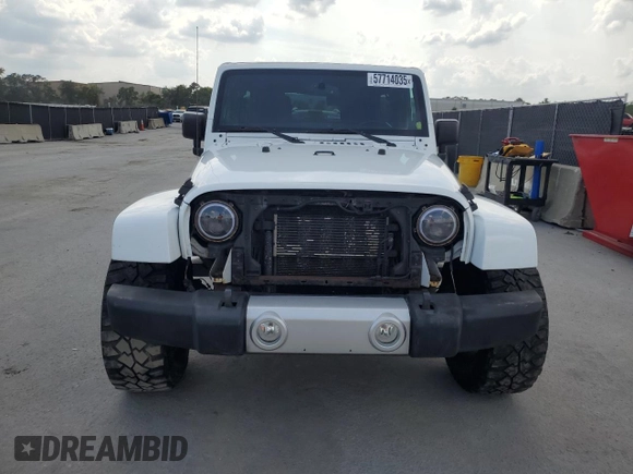 2013 Jeep Wrangler Unlimited Sahara with VIN 1C4BJWEG4DL536694, listed as a Copart auction lot 57714035 with 146,257 mi miles and Salvage title. Bid and sale history available at DreamBid. Image 5.
