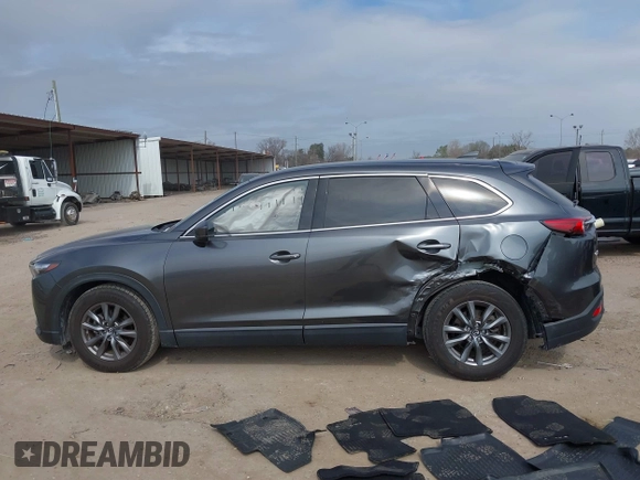 2021 Mazda CX-9 Touring with VIN JM3TCACY7M0516185, listed as a IAAI auction lot 41524084 with 53,084 mi miles. Bid and sale history available at carsss.com. Image 14.