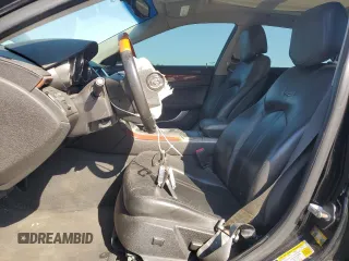 2011 Cadillac CTS Luxury z VIN 1G6DH5EYXB0151097, wystawiony jako Copart lot #53930905 z przebiegiem 136 515 mil mil oraz Szkoda całkowita • Salvage title. Historia ofert i sprzedaży dostępna na DreamBid. Obrazek 7.