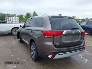 2019 Mitsubishi Outlander ES with VIN JA4AZ3A31KZ043372, listed as a IAAI auction lot 42306119 with 195,635 mi miles and . Bid and sale history available at DreamBid. Image 3.