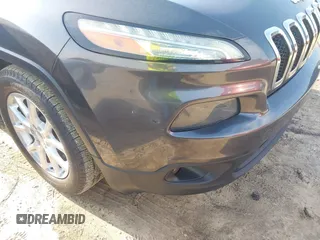 2014 Jeep Cherokee Latitude with VIN 1C4PJLCB6EW241897, listed as a IAAI auction lot 42128880 with 126,242 mi miles. Bid and sale history available at carsss.com. Image 6.