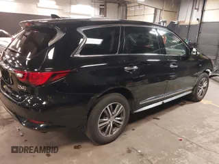 2020 Infiniti QX60 Luxe with VIN 5N1DL0MM4LC540617, listed as a IAAI auction lot 42232162 with 57,866 mi miles and . Bid and sale history available at DreamBid. Image 4.