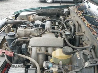 1999 Toyota Tacoma with VIN 4TAWM72N3XZ571550, listed as a IAAI auction lot 41116697 with 402,499 mi miles and . Bid and sale history available at DreamBid. Image 12.