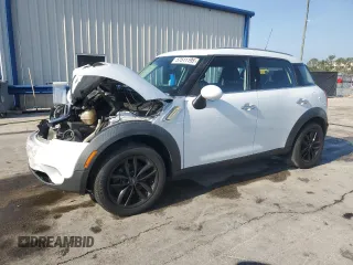 2016 MINI Countryman z VIN WMWZB3C53GWR49833, wystawiony jako Copart lot #57511195 z przebiegiem 122 556 mil mil oraz Szkoda całkowita • Salvage title. Historia ofert i sprzedaży dostępna na DreamBid. Obrazek 1.