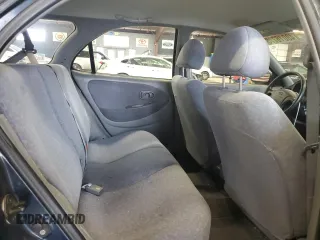 2000 Hyundai Elantra z VIN KMHJW35F5YU181324, wystawiony jako Copart lot #48016775 z przebiegiem 79 686 mil mil oraz Czysty tytuł • Clean title. Historia ofert i sprzedaży dostępna na DreamBid. Obrazek 11.
