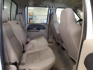 2005 Ford F-350 XL z VIN 1FTWW31P25EC64594, wystawiony jako Copart lot #61291725 z przebiegiem 209 965 mil mil oraz Czysty tytuł • Clean title. Historia ofert i sprzedaży dostępna na DreamBid. Obrazek 10.