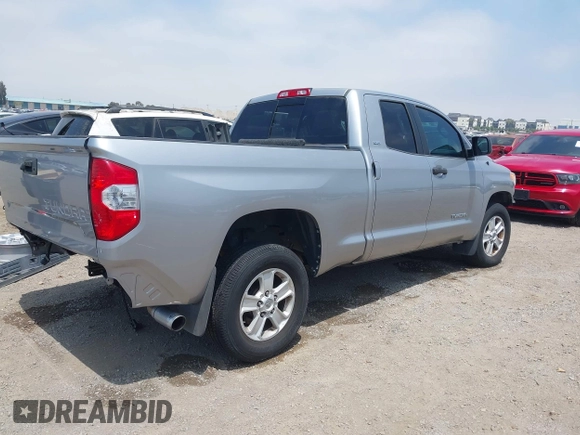 2016 Toyota Tundra SR z VIN 5TFRM5F1XGX099453, wystawiony jako IAAI lot #42492840 z przebiegiem 54 060 mil mil oraz . Historia ofert i sprzedaży dostępna na DreamBid. Obrazek 4.