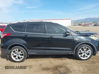 2014 Ford Escape Titanium with VIN 1FMCU9J93EUE27803, listed as a IAAI auction lot 42028249 with 131,194 mi miles and . Bid and sale history available at DreamBid. Image 12.