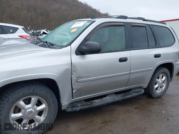 2006 GMC Envoy SLE z VIN 1GKDT13S562187698, wystawiony jako IAAI lot #41808778 z przebiegiem 167 023 mil mil oraz . Historia ofert i sprzedaży dostępna na DreamBid. Obrazek 6.