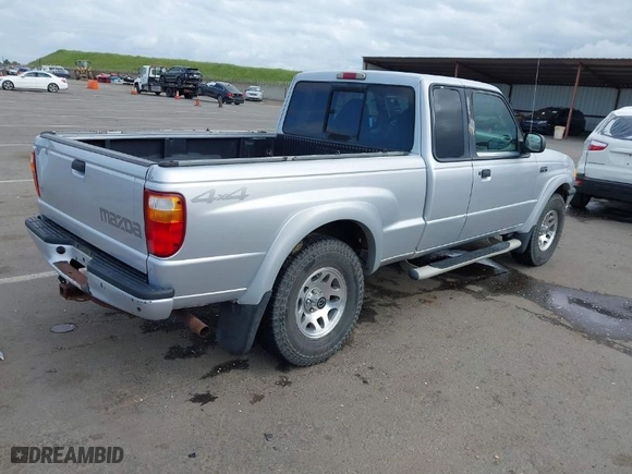 2003 Mazda B-Series 4WD Truck with VIN 4F4ZR47E63TM06204, listed as a IAAI auction lot 41895935 with 259,901 mi miles. Bid and sale history available at carsss.com. Image 4.