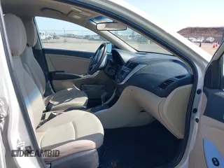 2016 Hyundai Accent SE z VIN KMHCT4AE9GU107391, wystawiony jako IAAI lot #42432983 z przebiegiem 132 260 mil mil oraz . Historia ofert i sprzedaży dostępna na DreamBid. Obrazek 5.