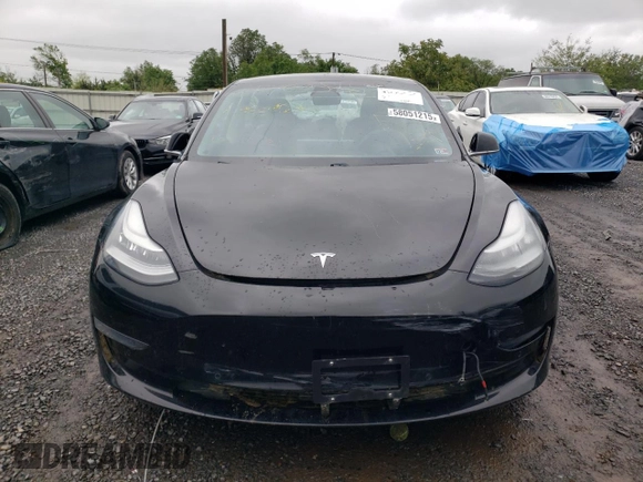 2019 Tesla Model 3 Mid Range z VIN 5YJ3E1EA0KF394514, wystawiony jako Copart lot #58051215 z przebiegiem Nie podano mil oraz Szkody całkowita. Historia ofert i sprzedaży dostępna na DreamBid. Obrazek 5.