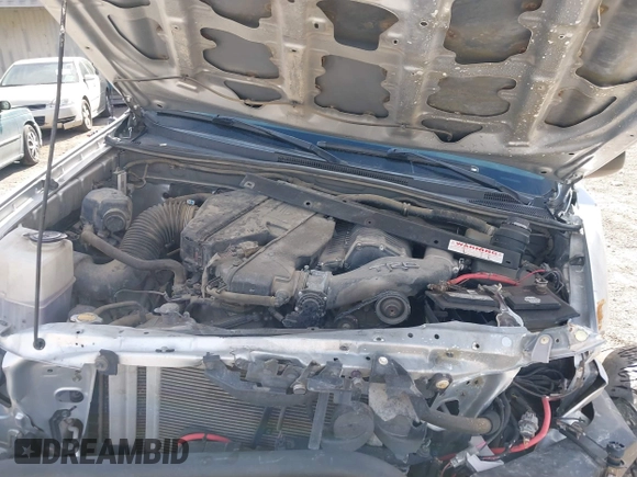 2013 Toyota Tacoma with VIN 5TFLU4EN2DX049615, listed as a IAAI auction lot 41893876 with 160,752 mi miles and . Bid and sale history available at DreamBid. Image 10.