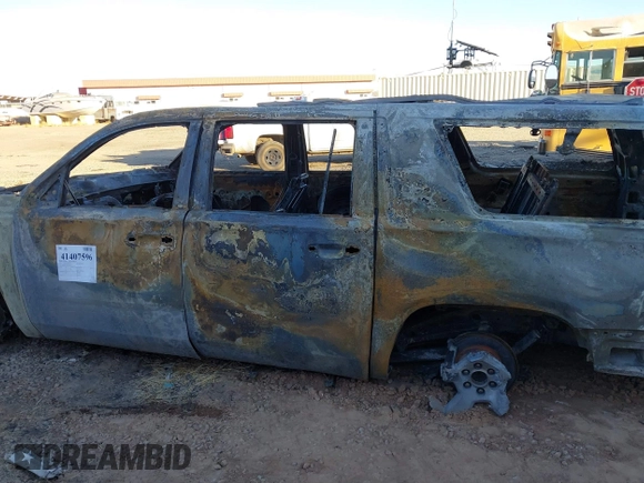 2019 Chevrolet Suburban LT with VIN 1GNSCHKC2KR395939, listed as a IAAI auction lot 41407596 with Not Provided miles and . Bid and sale history available at DreamBid. Image 13.