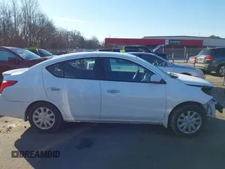 2017 Nissan Versa S Plus z VIN 3N1CN7AP6HL898849, wystawiony jako IAAI lot #41501925 z przebiegiem 132 440 mil mil oraz . Historia ofert i sprzedaży dostępna na DreamBid. Obrazek 13.