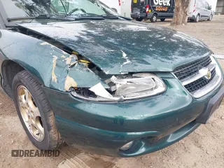 1998 Chrysler Sebring JXi with VIN 3C3EL55H6WT232076, listed as a IAAI auction lot 41906230 with 54,718 mi miles and . Bid and sale history available at DreamBid. Image 6.